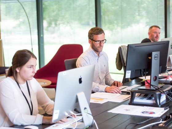 Staff working in a well lit office